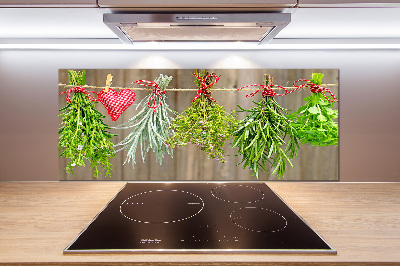 Rivestimento parete cucina con motivo di erbe aromatiche su un filo