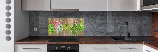 Rivestimento parete cucina con motivo di erbe aromatiche su un filo