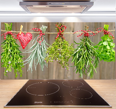 Rivestimento parete cucina con motivo di erbe aromatiche su un filo