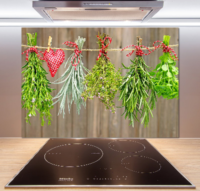 Rivestimento parete cucina con motivo di erbe aromatiche su un filo