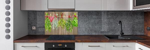 Rivestimento parete cucina con motivo di erbe aromatiche su un filo