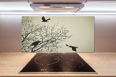 Pannello retrocucina con il motivo di corvi su un albero