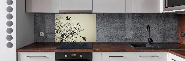Pannello retrocucina con il motivo di corvi su un albero