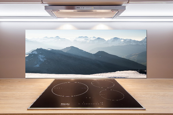 Rivestimento parete cucina con decorazione a motivo di cime montuose