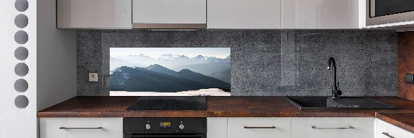 Rivestimento parete cucina con decorazione a motivo di cime montuose
