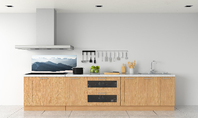 Rivestimento parete cucina con decorazione a motivo di cime montuose