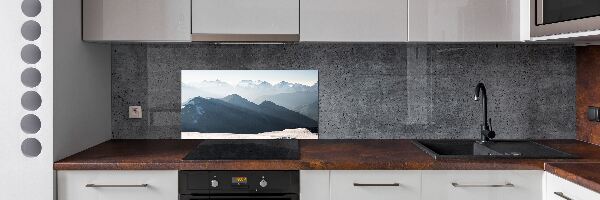 Rivestimento parete cucina con decorazione a motivo di cime montuose