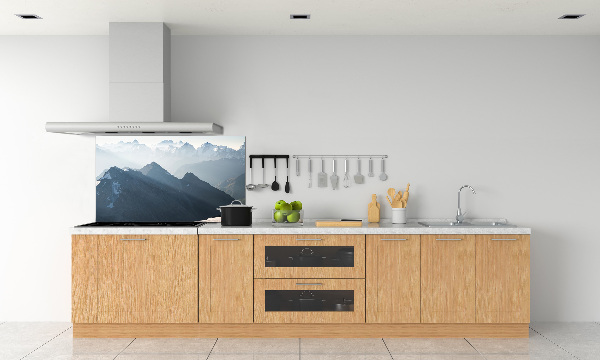 Rivestimento parete cucina con decorazione a motivo di cime montuose