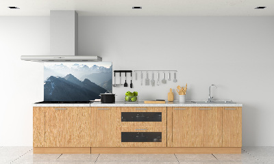 Rivestimento parete cucina con decorazione a motivo di cime montuose