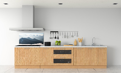 Rivestimento parete cucina con decorazione a motivo di cime montuose