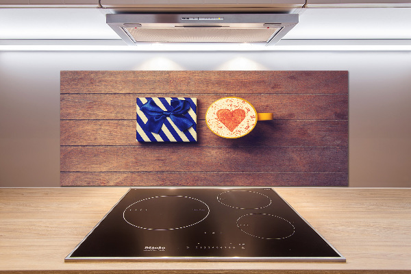 Pannello retrocucina con motivo a tema caffè e accompagnato da un regalo