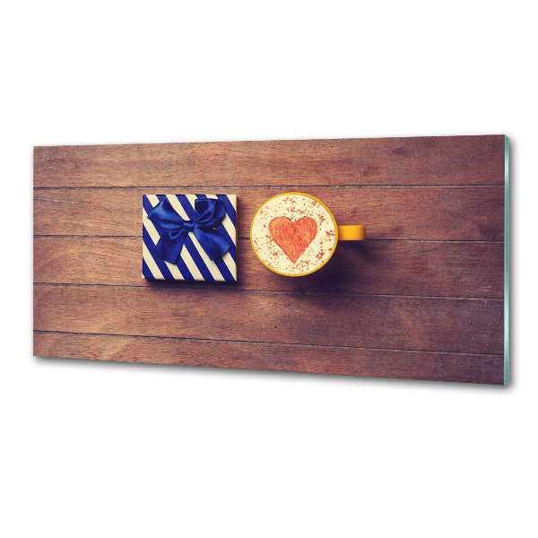 Pannello retrocucina con motivo a tema caffè e accompagnato da un regalo