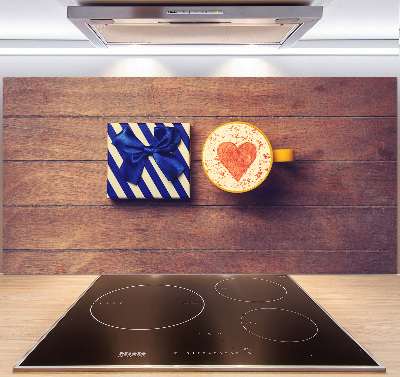 Pannello retrocucina con motivo a tema caffè e accompagnato da un regalo