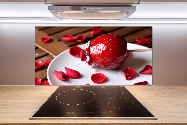 Pannello paraschizzi cucina con stampa di una mela su un bastoncino