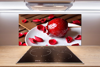 Pannello paraschizzi cucina con stampa di una mela su un bastoncino