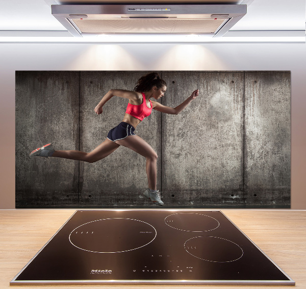 Pannello paraschizzi cucina con stampa raffigurante una donna che corre