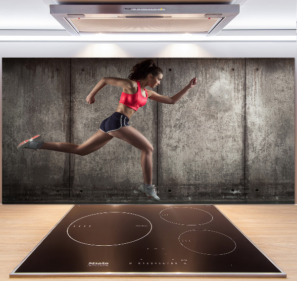 Pannello paraschizzi cucina con stampa raffigurante una donna che corre