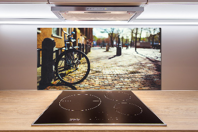 Pannello paraschizzi cucina con stampa raffigurante una scena di persone che vanno in bicicletta ad Amsterdam