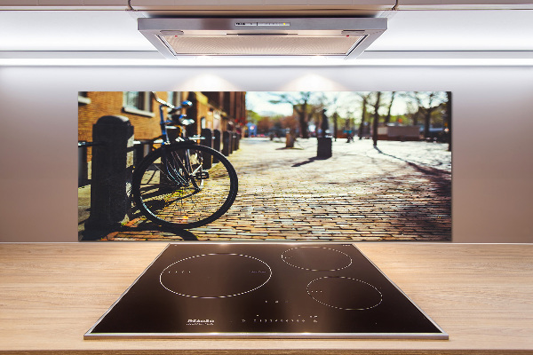 Pannello paraschizzi cucina con stampa raffigurante una scena di persone che vanno in bicicletta ad Amsterdam