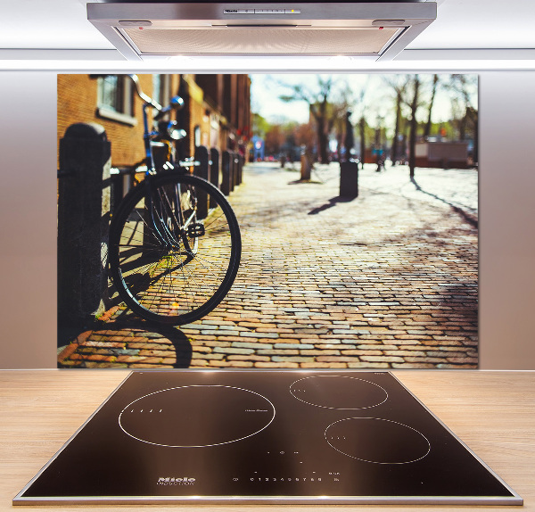 Pannello paraschizzi cucina con stampa raffigurante una scena di persone che vanno in bicicletta ad Amsterdam