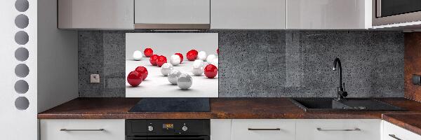 Pannello retrocucina con motivo di palline rosse e bianche
