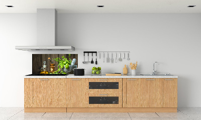 Rivestimento parete cucina con decorazione a tema erbe aromatiche raffigurate in un mortaio