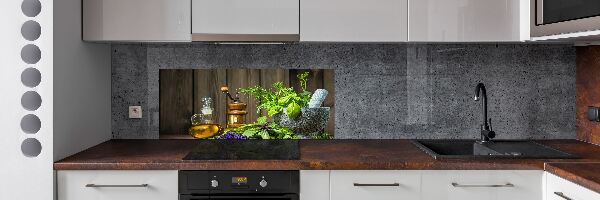 Rivestimento parete cucina con decorazione a tema erbe aromatiche raffigurate in un mortaio