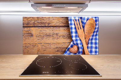 Rivestimento parete cucina con utensili in legno