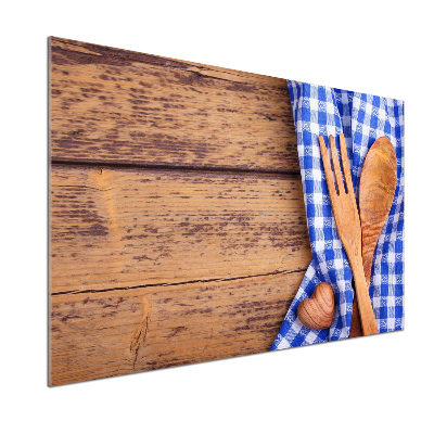 Rivestimento parete cucina con utensili in legno