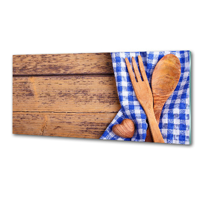 Rivestimento parete cucina con utensili in legno