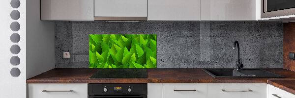 Rivestimento parete cucina con decorazione a foglie verdi