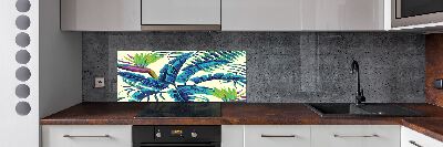 Rivestimento parete cucina con motivo a foglie tropicali
