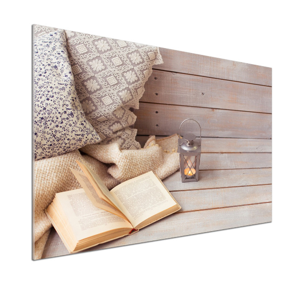 Pannello paraschizzi cucina con stampa decorativa raffigurante una persona che si rilassa leggendo un libro