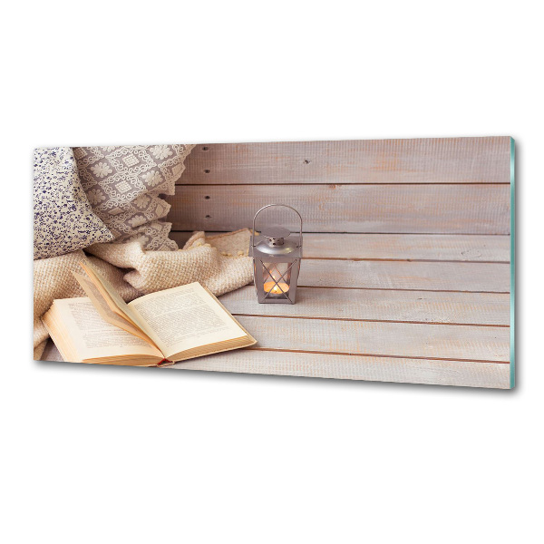 Pannello paraschizzi cucina con stampa decorativa raffigurante una persona che si rilassa leggendo un libro