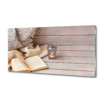 Pannello paraschizzi cucina con stampa decorativa raffigurante una persona che si rilassa leggendo un libro