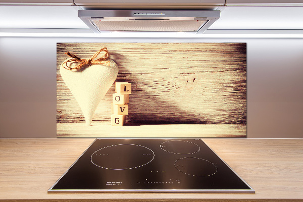 Pannello paraschizzi cucina con la scritta 