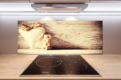 Pannello paraschizzi cucina con la scritta 