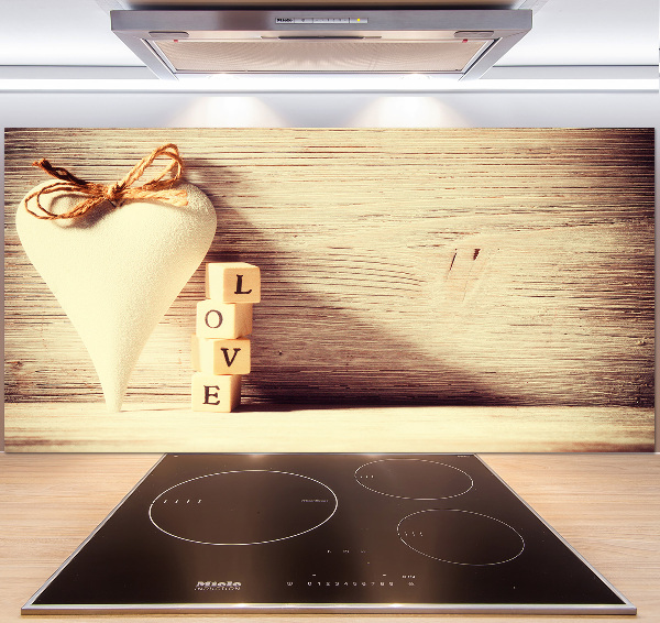 Pannello paraschizzi cucina con la scritta 