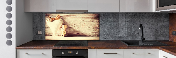 Pannello paraschizzi cucina con la scritta 