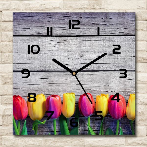 Orologio quadrato con decorazione di tulipani su fondo effetto legno
