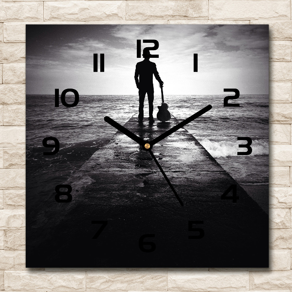 Orologio quadrato in vetro con decorazione raffigurante un chitarrista sul molo