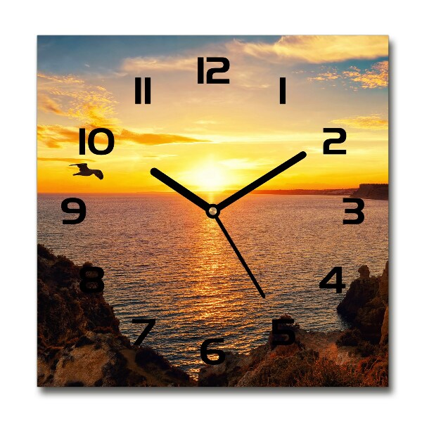 Orologio quadrato con motivo mare al tramonto