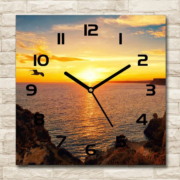 Orologio quadrato con motivo mare al tramonto