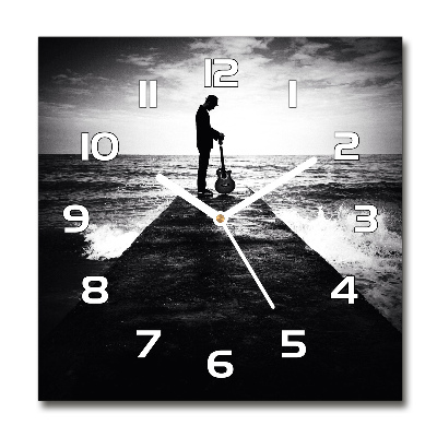 Orologio da parete quadrato con motivo di chitarrista sul molo