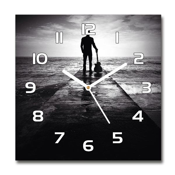 Orologio quadrato con decorazione raffigurante un chitarrista sul molo