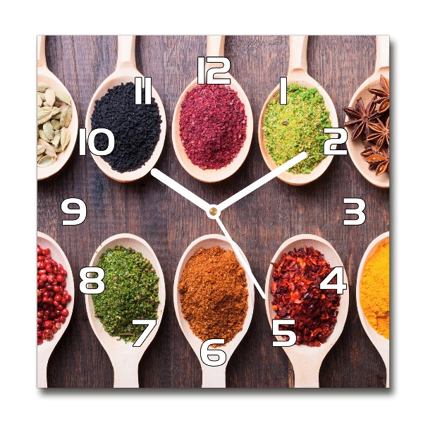 Orologio quadrato con quadrante decorato con motivi di spezie colorate