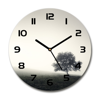 Orologio rotondo con decorazione a motivo di albero solitario