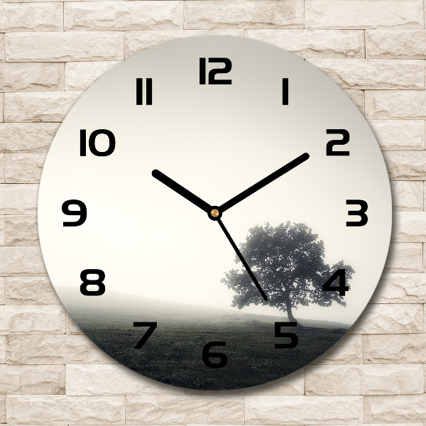 Orologio rotondo con decorazione a motivo di albero solitario