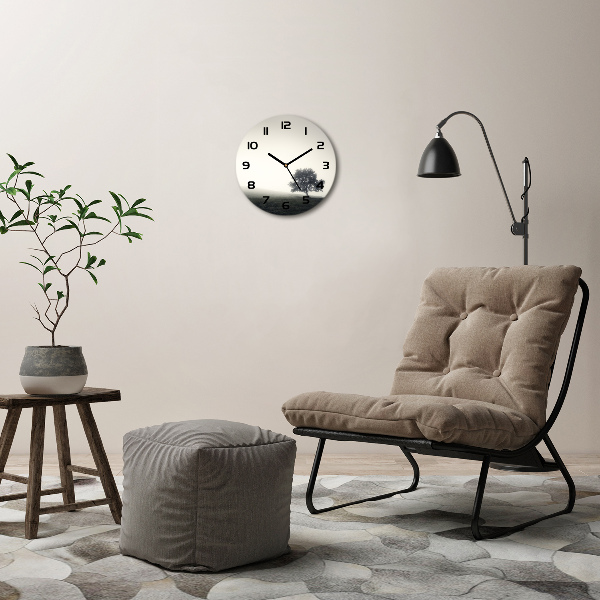 Orologio rotondo con decorazione a motivo di albero solitario