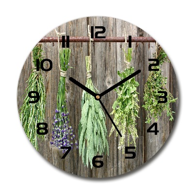 Orologio da parete rotondo con decorazione a motivo di erbe aromatiche su un filo